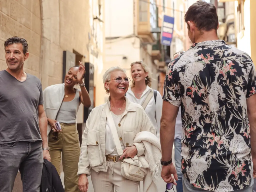 Walking the street in Palma de Mallorca during the self-guided food tour