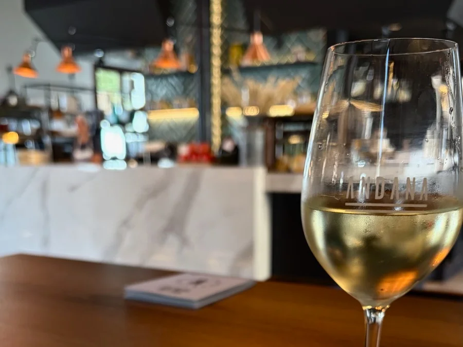 A glass of wine is waiting at Andana Restaurant during your Palma culinary experience
